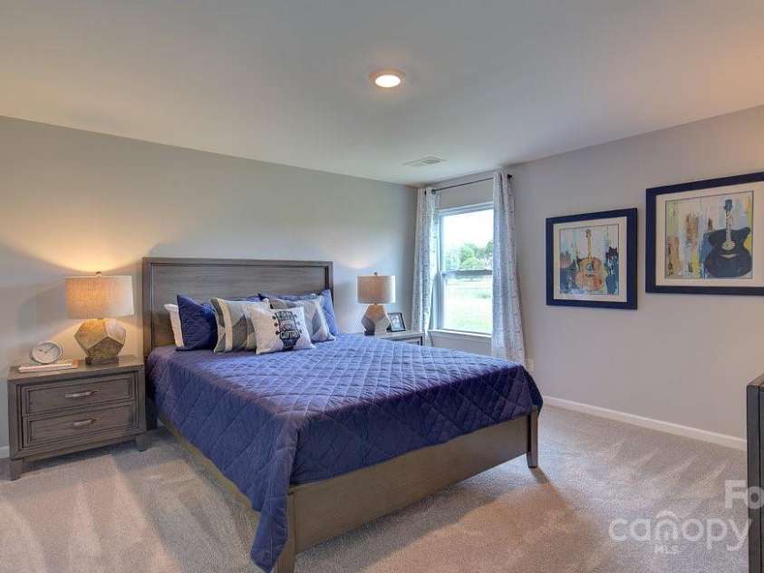 145 Bovine Branch Road, Fletcher, NC 28732.  MLS# CAR4286892, YatesRealty ID 30258. Photos are representative