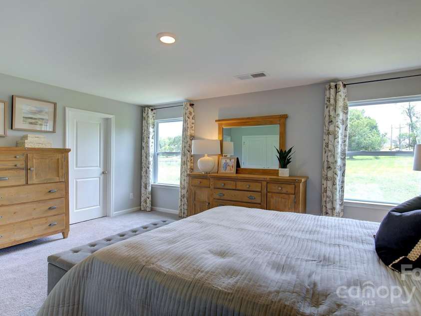 145 Bovine Branch Road, Fletcher, NC 28732.  MLS# CAR4286892, YatesRealty ID 30258. Photos are representative