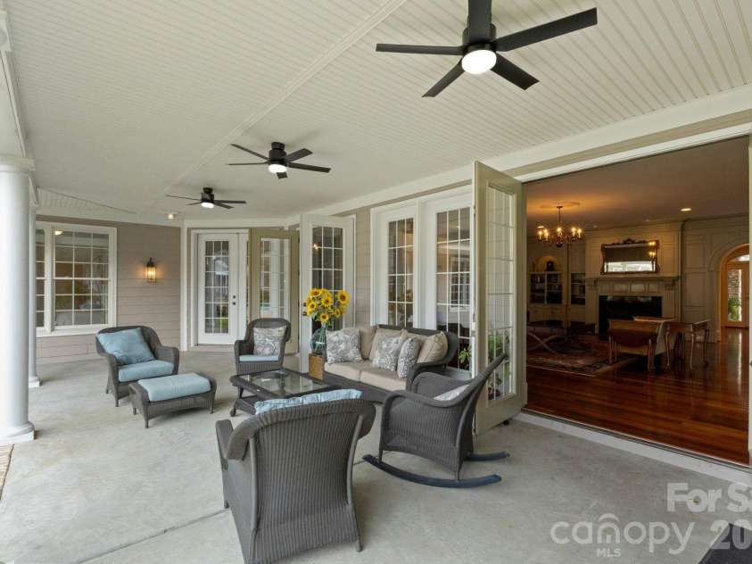 393 Youngs Bend Road, Kershaw, SC 29067.  MLS# CAR4317045, YatesRealty ID 3026. Expansive covered wrap-around terrace