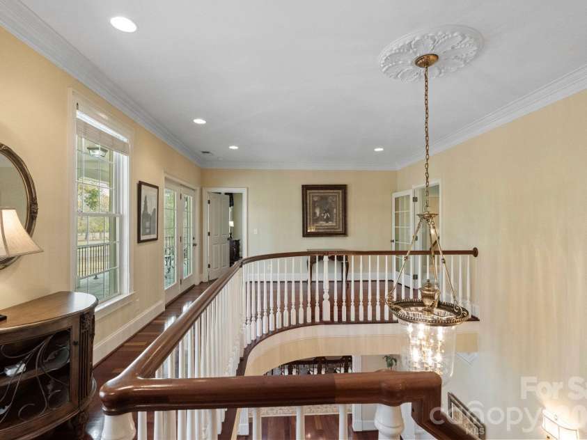 393 Youngs Bend Road, Kershaw, SC 29067.  MLS# CAR4317045, YatesRealty ID 3026. Grand foyer upstairs leading to balcony