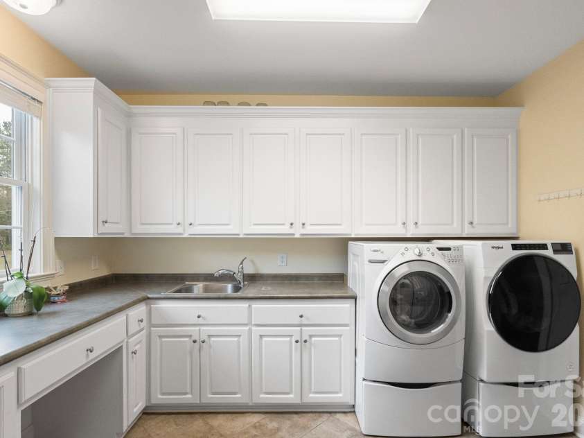 393 Youngs Bend Road, Kershaw, SC 29067.  MLS# CAR4317045, YatesRealty ID 3026. One of three laundry rooms