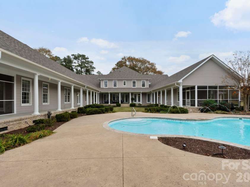 393 Youngs Bend Road, Kershaw, SC 29067.  MLS# CAR4317045, YatesRealty ID 3026. Private in-ground pool oasis with stylish hardscape patio