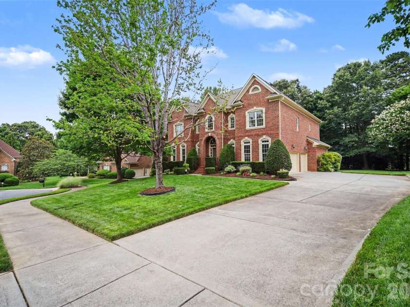 7518 Meadowgate Lane, Marvin, NC 28173.  MLS# CAR4385632, YatesRealty ID 30264. Side Load 3 car garage