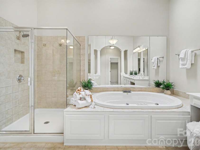 7518 Meadowgate Lane, Marvin, NC 28173.  MLS# CAR4385632, YatesRealty ID 30264. Spacious Primary Bathroom with skylight