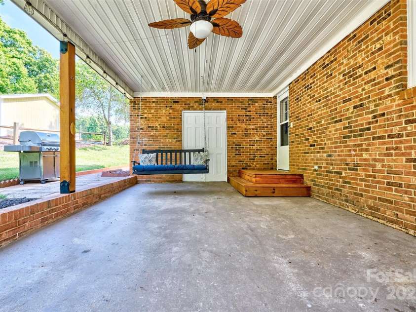 7753 Caswell Road, Stanley, NC 28164.  MLS# CAR4276529, YatesRealty ID 30264. 1 car carport