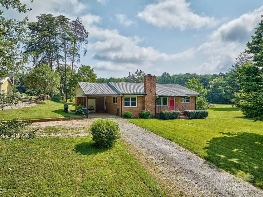 7753 Caswell Road, Stanley, NC 28164.  MLS# CAR4276529, YatesRealty ID 30264. All brick ranch home with no HOA or city taxes