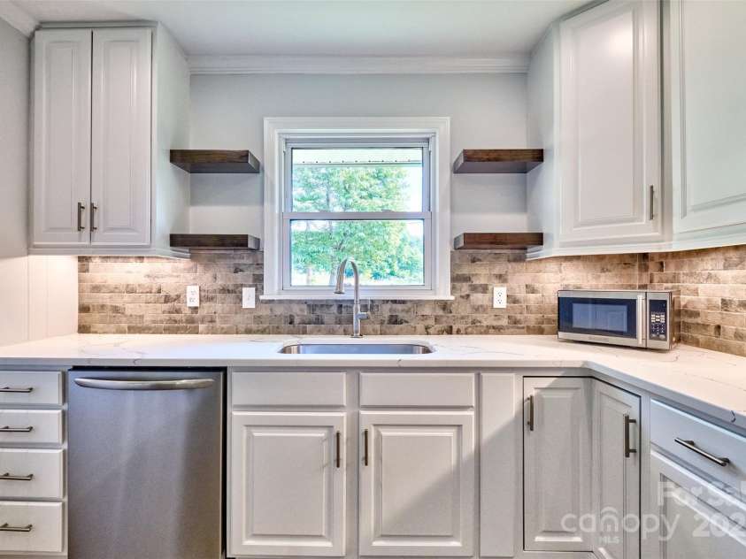 7753 Caswell Road, Stanley, NC 28164.  MLS# CAR4276529, YatesRealty ID 30264. Lots of storage