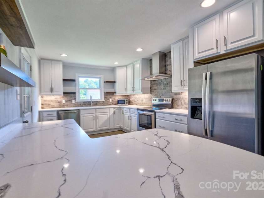 7753 Caswell Road, Stanley, NC 28164.  MLS# CAR4276529, YatesRealty ID 30264. New granite countertops