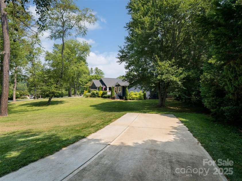 206 Pinner Road, Arden, NC 28704.  MLS# CAR4276364, YatesRealty ID 30266. Additional parking pad at side of house, perfect for RV parking.