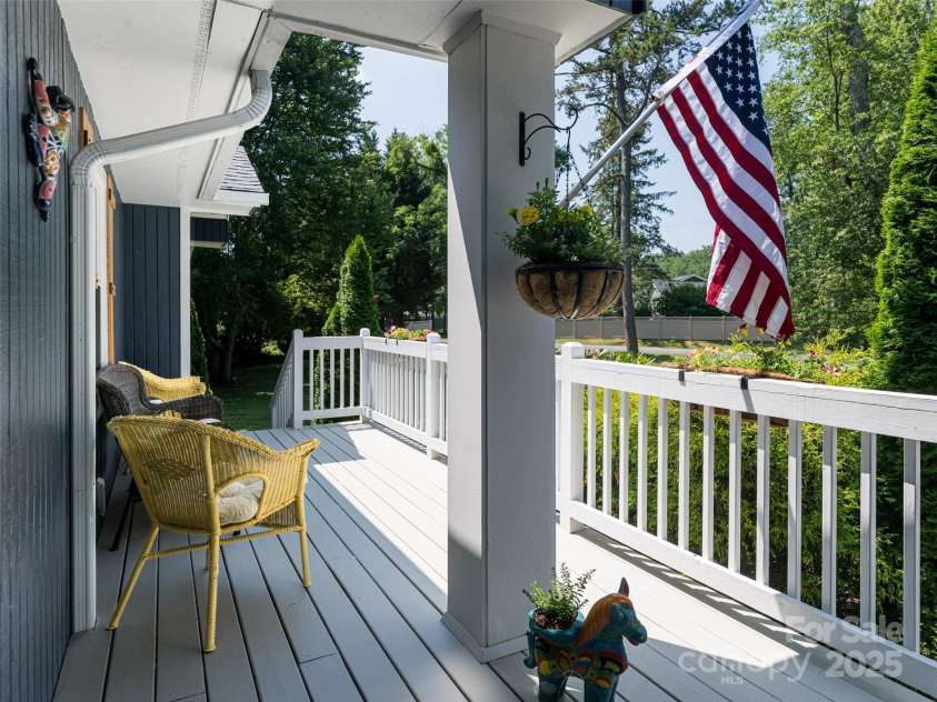 206 Pinner Road, Arden, NC 28704.  MLS# CAR4276364, YatesRealty ID 30266. Deck on front of house leading to both driveways
