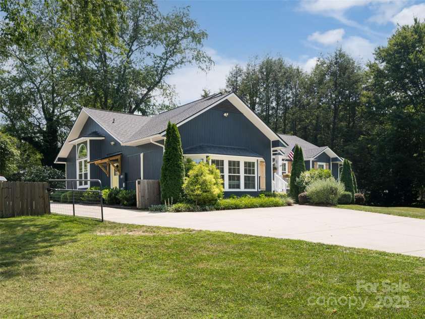 206 Pinner Road, Arden, NC 28704.  MLS# CAR4276364, YatesRealty ID 30266. Fenced in yard with electric gate
