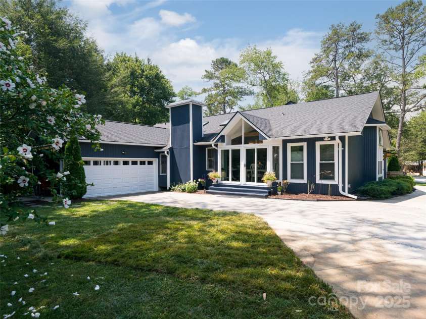 206 Pinner Road, Arden, NC 28704.  MLS# CAR4276364, YatesRealty ID 30266. Garage at back of house for extra privacy