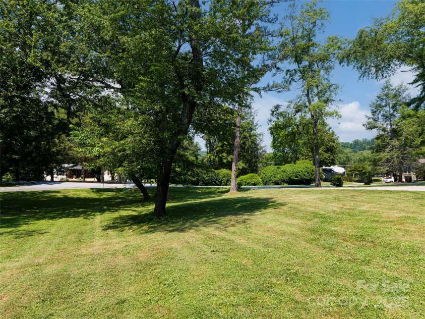 206 Pinner Road, Arden, NC 28704.  MLS# CAR4276364, YatesRealty ID 30266. Large .78 acre lot, tranquil and inviting.