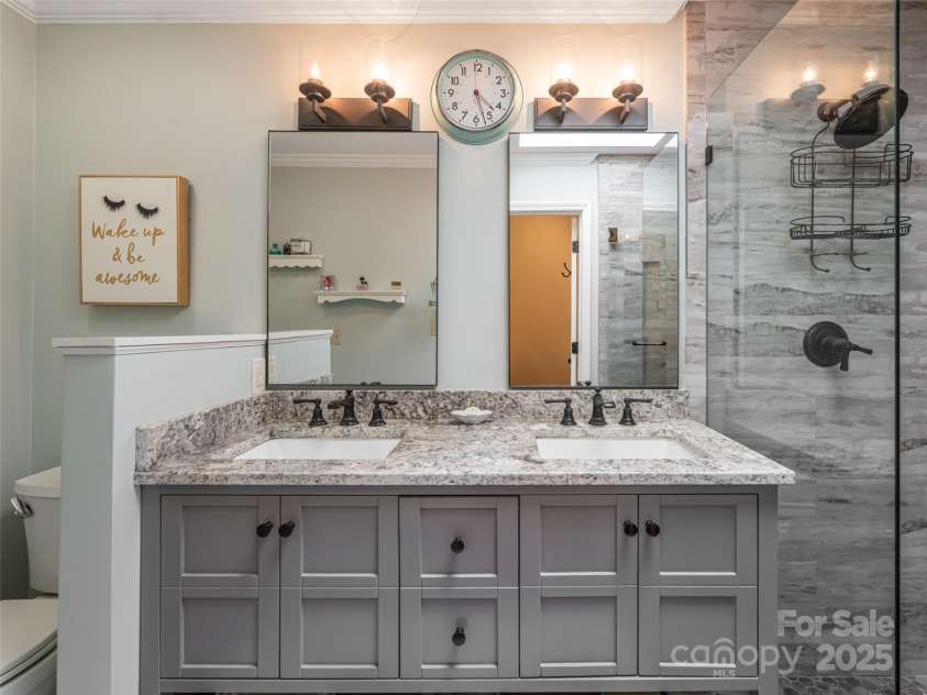 206 Pinner Road, Arden, NC 28704.  MLS# CAR4276364, YatesRealty ID 30266. Owners suite bath with double vanity