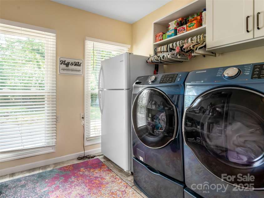 206 Pinner Road, Arden, NC 28704.  MLS# CAR4276364, YatesRealty ID 30266. Spacious laundry room can double as a chefs pantry