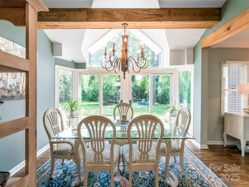 206 Pinner Road, Arden, NC 28704.  MLS# CAR4276364, YatesRealty ID 30266. Stunning dining room open to family room