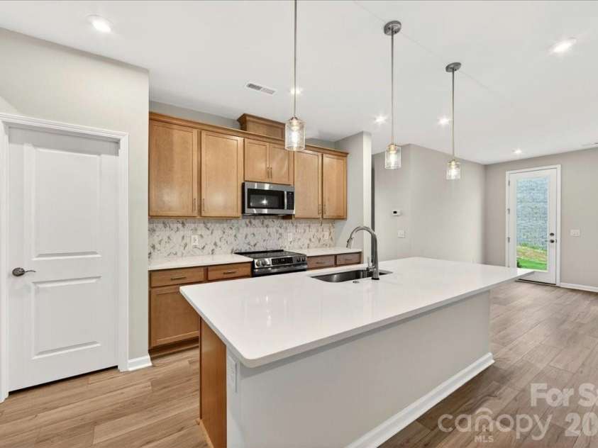 606 Webster Lane, Cramerton, NC 28032.  MLS# CAR4342274, YatesRealty ID 30268. Large kitchen island
