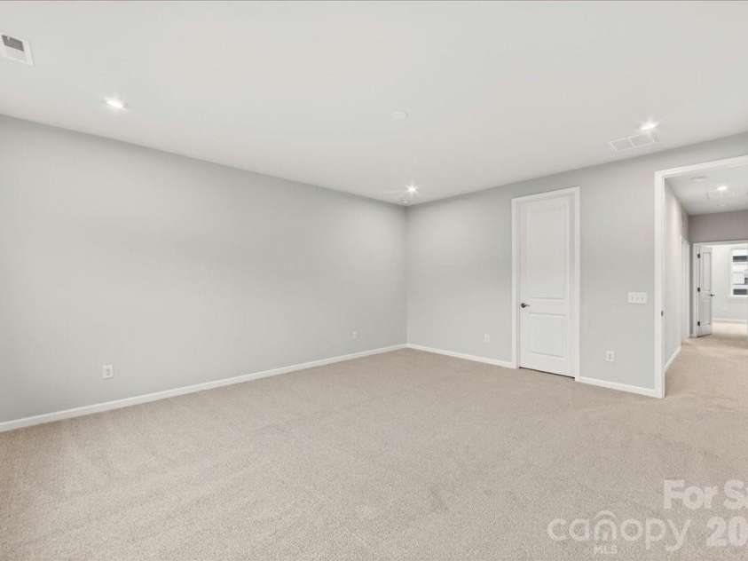 606 Webster Lane, Cramerton, NC 28032.  MLS# CAR4342274, YatesRealty ID 30268. Light filled primary bedroom