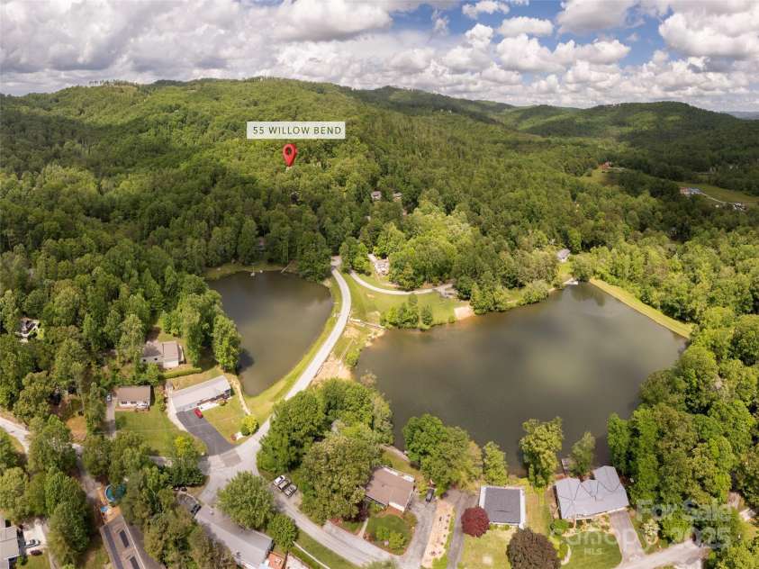 55 Willow Bend, Hendersonville, NC 28792.  MLS# CAR4255625, YatesRealty ID 30273. Ariel Views showing location of home in community and Lakes.