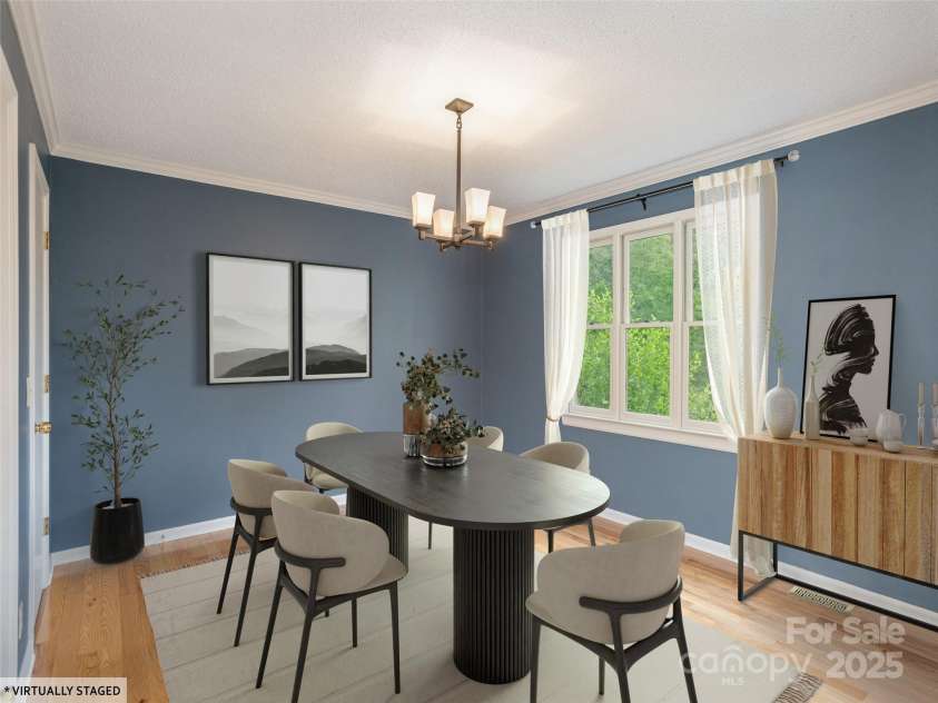 55 Willow Bend, Hendersonville, NC 28792.  MLS# CAR4255625, YatesRealty ID 30273. Main floor primary suite, staged a formal dining space. Located adjacent to kitchen.