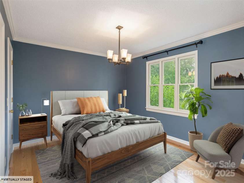 55 Willow Bend, Hendersonville, NC 28792.  MLS# CAR4255625, YatesRealty ID 30273. Primary suite on main floor with hardwoods, walk in closet and en-suite full bathroom.  Has also been used as a formal dining room.