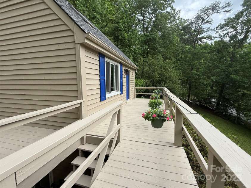 55 Willow Bend, Hendersonville, NC 28792.  MLS# CAR4255625, YatesRealty ID 30273. View of front deck space