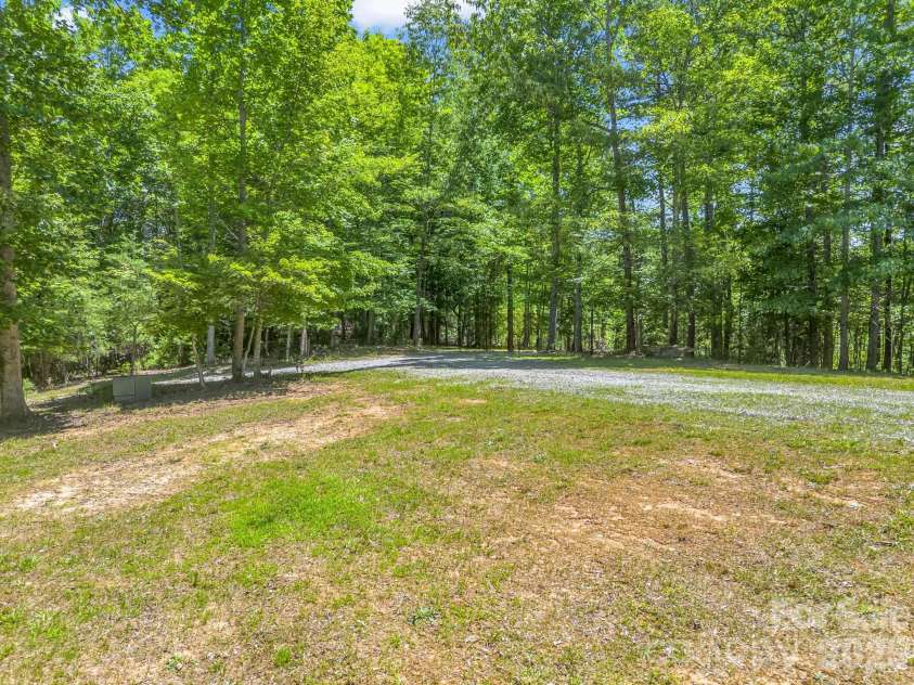 144 Old Homeplace Lane, Mills River, NC 28759.  MLS# CAR4361682, YatesRealty ID 30284. Expansive front yard