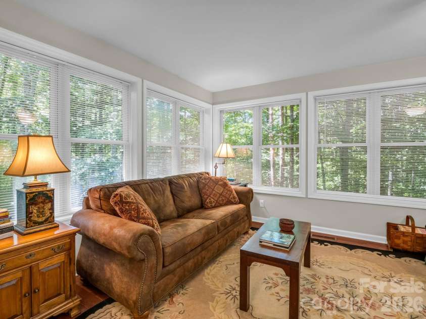 144 Old Homeplace Lane, Mills River, NC 28759.  MLS# CAR4361682, YatesRealty ID 30284. Sleeper sofa in this room provides additional sleeping area for guests.