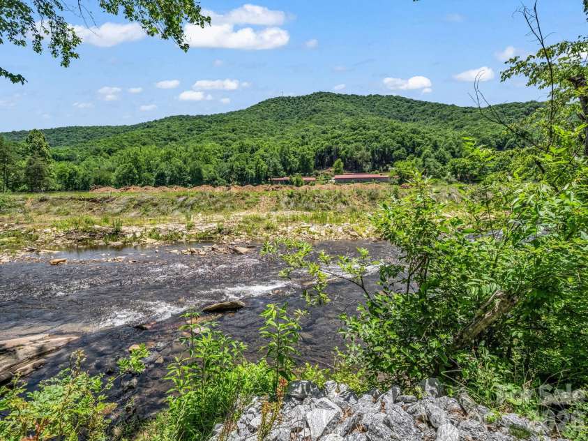 144 Old Homeplace Lane, Mills River, NC 28759.  MLS# CAR4361682, YatesRealty ID 30284. Your own river front access!