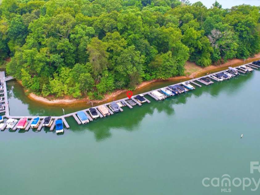 2937 Shady Reach Lane, Charlotte, NC 28214.  MLS# CAR4391581, YatesRealty ID 30285. Deeded Boat Slip #55 with 6800 lb lift