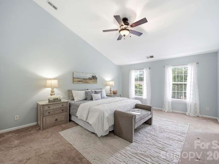 2937 Shady Reach Lane, Charlotte, NC 28214.  MLS# CAR4391581, YatesRealty ID 30285. Large Primary Bedroom with Vaulted Ceiling and Ceiling Fan