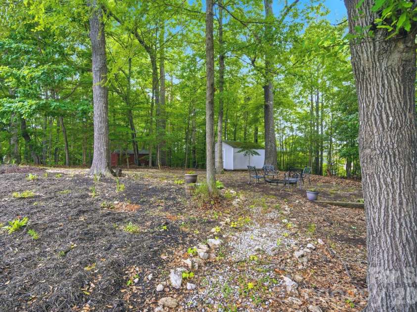 2937 Shady Reach Lane, Charlotte, NC 28214.  MLS# CAR4391581, YatesRealty ID 30285. Pathway to Storage Shed and Firepit