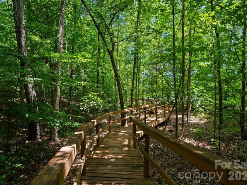 2937 Shady Reach Lane, Charlotte, NC 28214.  MLS# CAR4391581, YatesRealty ID 30285. Peaceful Pathway to Boat Slip