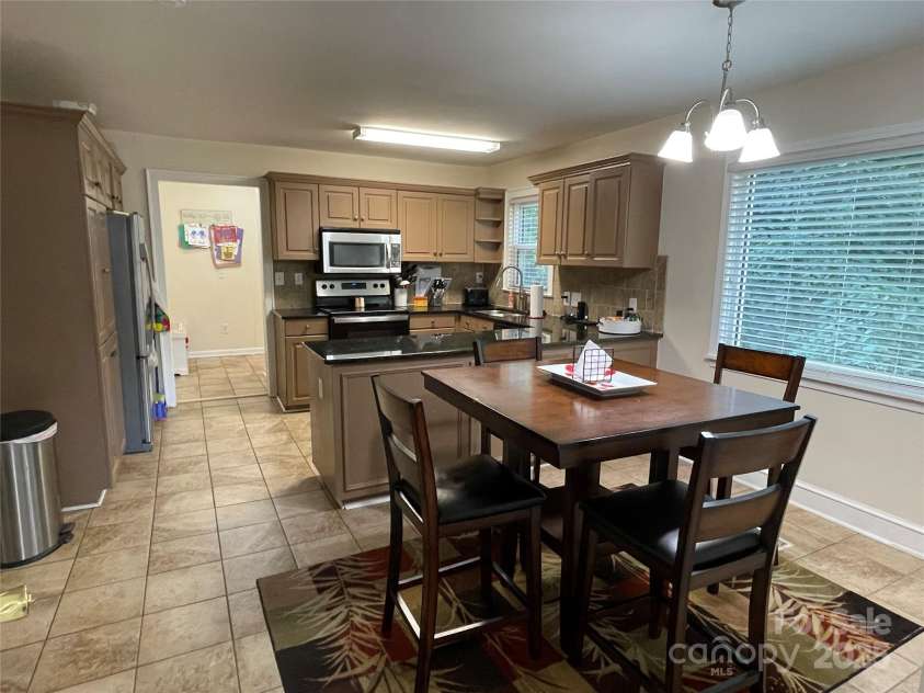 517 Stowe Drive, Lowell, NC 28098.  MLS# CAR4279841, YatesRealty ID 30285. 