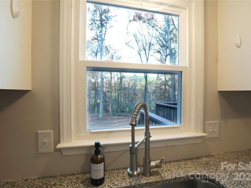 14027 Hackamore Drive, Matthews, NC 28105.  MLS# CAR4265300, YatesRealty ID 30286. Kitchen view with NEW window!