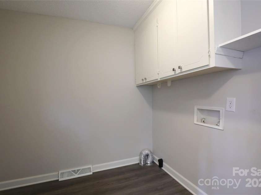 14027 Hackamore Drive, Matthews, NC 28105.  MLS# CAR4265300, YatesRealty ID 30286. Laundry Room with fresh paint!