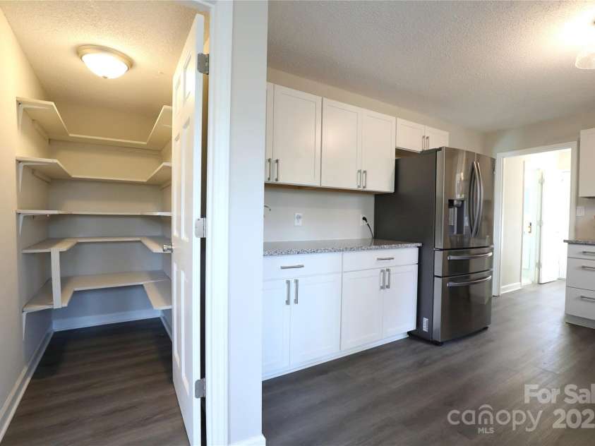 14027 Hackamore Drive, Matthews, NC 28105.  MLS# CAR4265300, YatesRealty ID 30286. Walk-in Pantry
