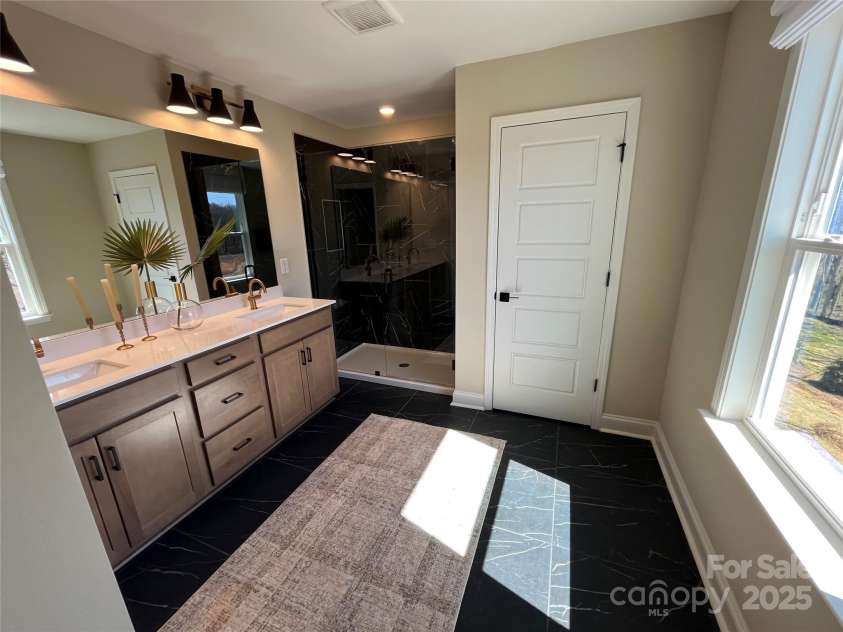 2021 Cunningham Farm Drive, Indian Trail, NC 28079.  MLS# CAR4269074, YatesRealty ID 30287. Model Home of floorplan , Not actualHome