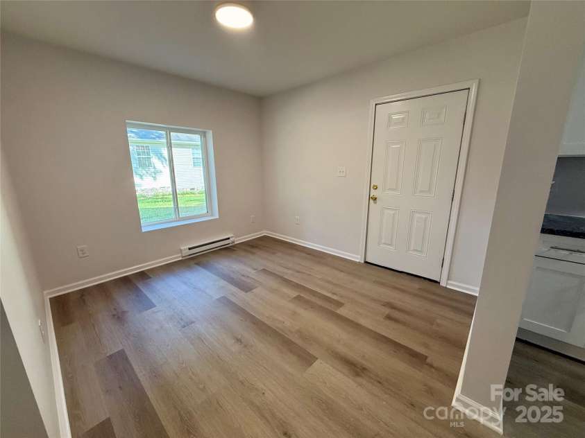1902 5th Avenue, Gastonia, NC 28052.  MLS# CAR4283317, YatesRealty ID 30289. Dining Room in Lower Level unit
