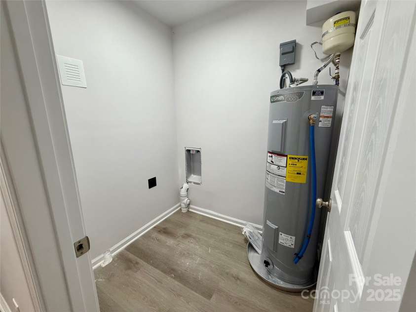 1902 5th Avenue, Gastonia, NC 28052.  MLS# CAR4283317, YatesRealty ID 30289. Lower Level duplex unit  laundry room
