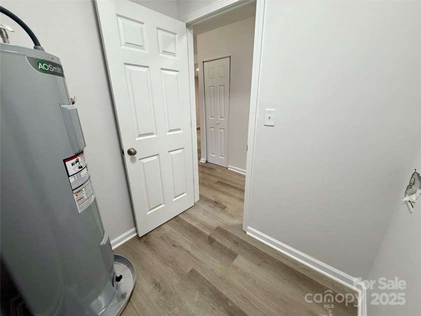 1902 5th Avenue, Gastonia, NC 28052.  MLS# CAR4283317, YatesRealty ID 30289. Lower Level duplex unit  laundry room