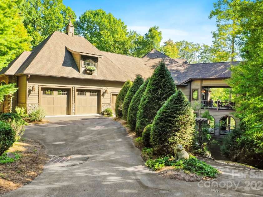 285 Wetherley None, Boone, NC 28607.  MLS# CAR4247849, YatesRealty ID 3029. Double driveways at rear of home