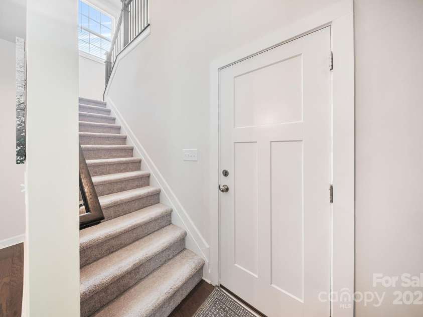 10903 Zac Hill Road, Davidson, NC 28036.  MLS# CAR4284070, YatesRealty ID 30291. Separate staircase leading to guest suite