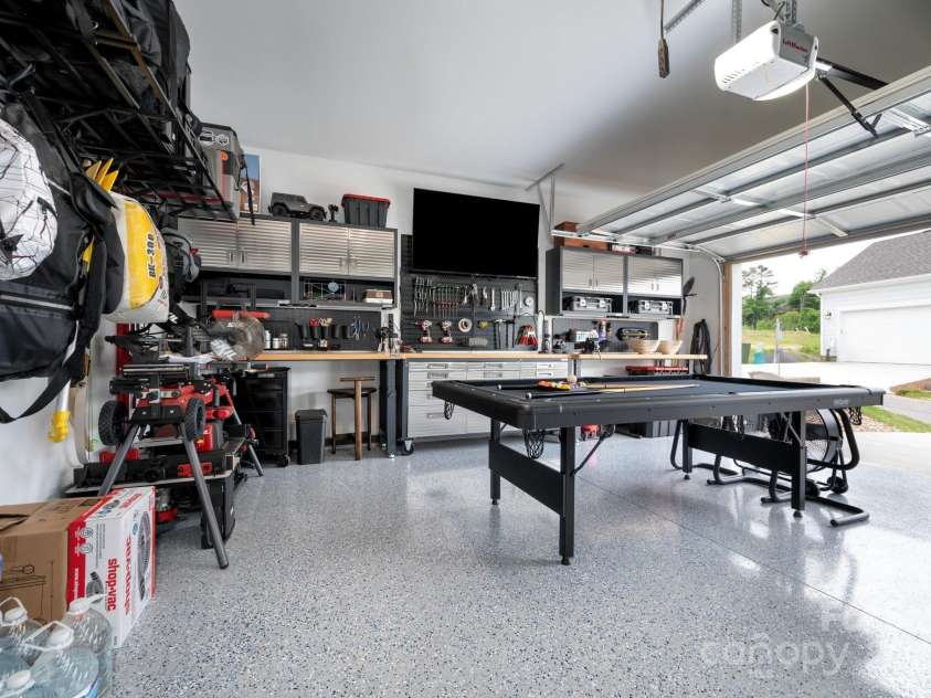 58 Walnut Springs Drive, Asheville, NC 28804.  MLS# CAR4259966, YatesRealty ID 30297. 2 car+ garage with upgraded epoxy coating