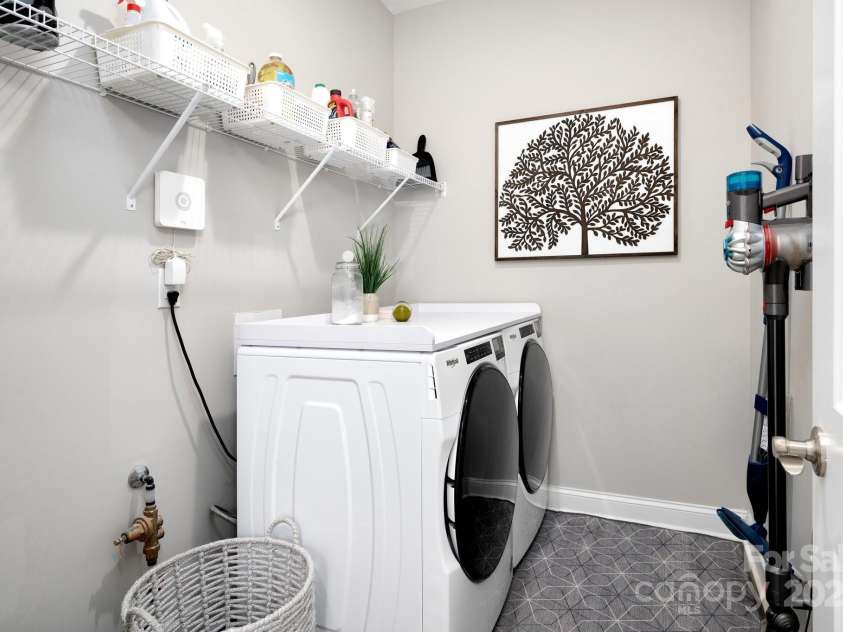 58 Walnut Springs Drive, Asheville, NC 28804.  MLS# CAR4259966, YatesRealty ID 30297. Full laundry room in this unit