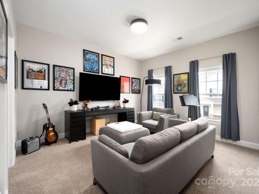 58 Walnut Springs Drive, Asheville, NC 28804.  MLS# CAR4259966, YatesRealty ID 30297. Guest room used for upper level den