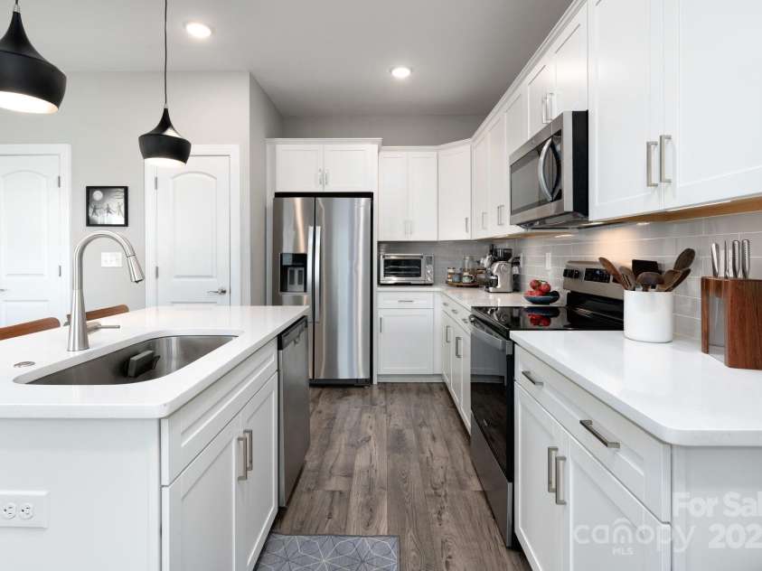 58 Walnut Springs Drive, Asheville, NC 28804.  MLS# CAR4259966, YatesRealty ID 30297. Under cabinet lighting and stainless appliances