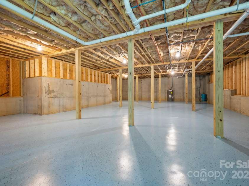 321 Benjamins Way, Hendersonville, NC 28792.  MLS# CAR4276870, YatesRealty ID 303. Basement stubbed for bathroom  and ready for your vision