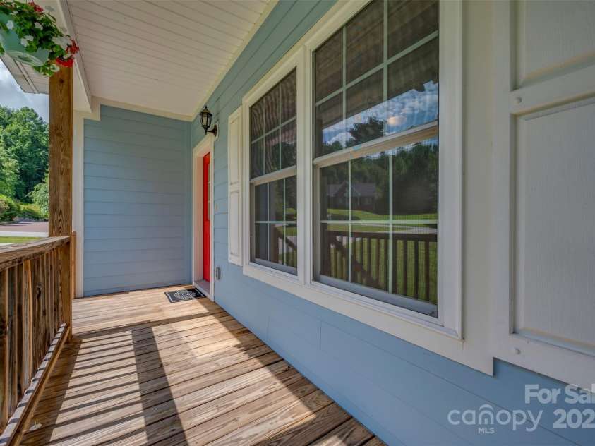 321 Benjamins Way, Hendersonville, NC 28792.  MLS# CAR4276870, YatesRealty ID 303. Covered front porch