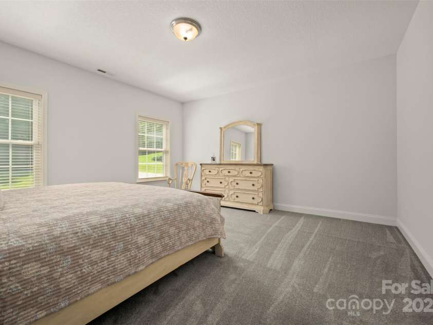 321 Benjamins Way, Hendersonville, NC 28792.  MLS# CAR4276870, YatesRealty ID 303. Large primary suite